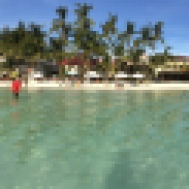 Panoramic shot from the clear blue water